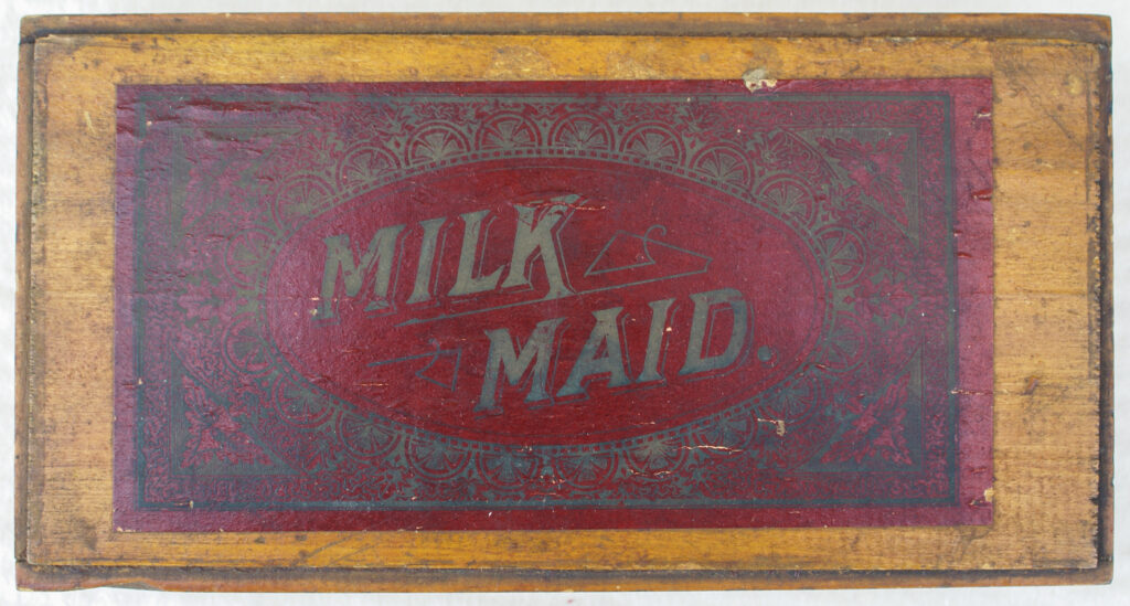 Tucker Tw ID • SRI-13c2 — AGPI ID • G-30046c2 — publisher • Selchow & Righter (unmarked, job — title • MILK MAID — notes • Wooden box with hinged top. — keywords • Selchow & Righter, game, publisher