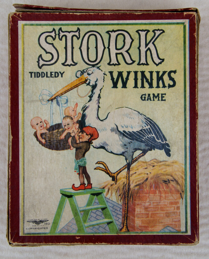 Tucker Tw ID • WIL-05v2c1 — AGPI ID • G-22719c1 — publisher • Wilder Mfg. Co. (St. Louis) — title • STORK TIDDLEDY WINKS GAME — notes • Publisher catalog number: 160. Logo: "YLDR" on black eagle. — keywords • game, game cover, gc-image